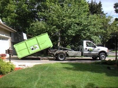 Truck Delivering Dumpster